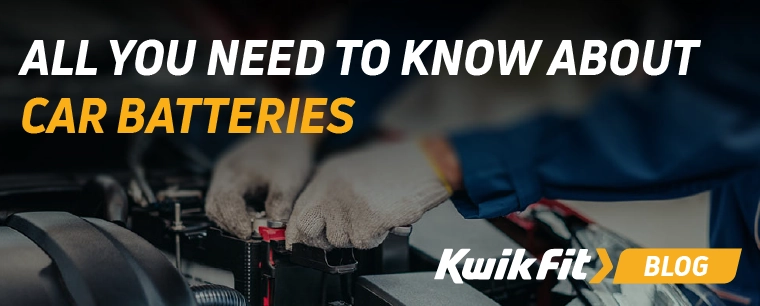 Car Battery with Jump Start Leads Connected to Terminals